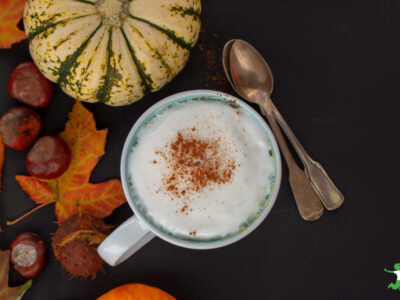 healthy pumpkin spice latte with seasonal background