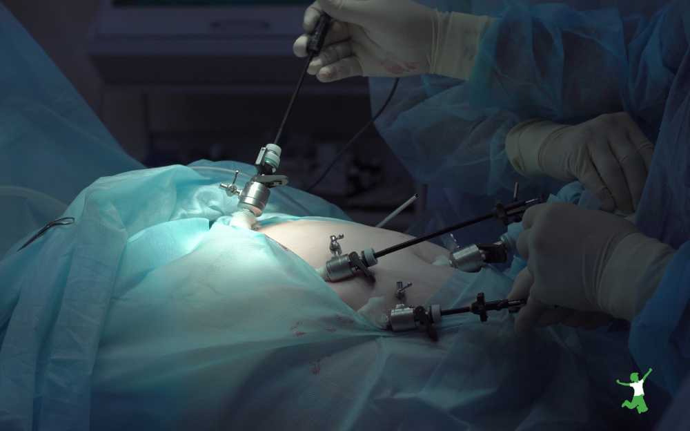 patient having abdominal gas removed after laparoscopic surgery