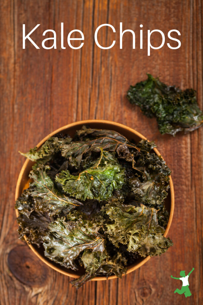 healthy kale chips on wooden background