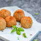 homemade hush puppies fried in healthy fat on white plate