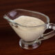 cultured tartar sauce in glass dish on wood table