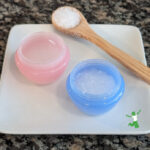 homemade magnesium sulfate paste in small containers with bamboo spoon