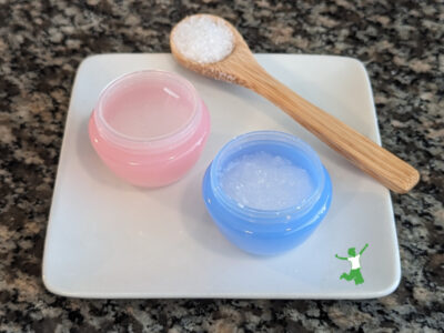homemade magnesium sulfate paste in small containers with bamboo spoon