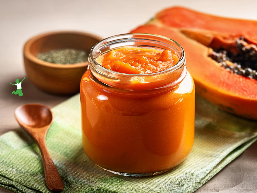 probiotic papaya butter in glass jar with wooden spoon