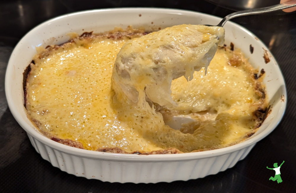 cheesy potatoes au gratin in casserole dish