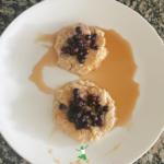 soaked oatmeal pancakes topped with blueberries on white plate