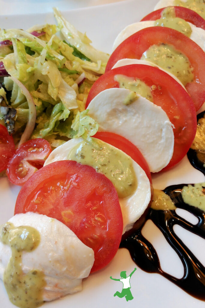 healthy caprese salad with heirloom tomatoes and fresh mozzarella