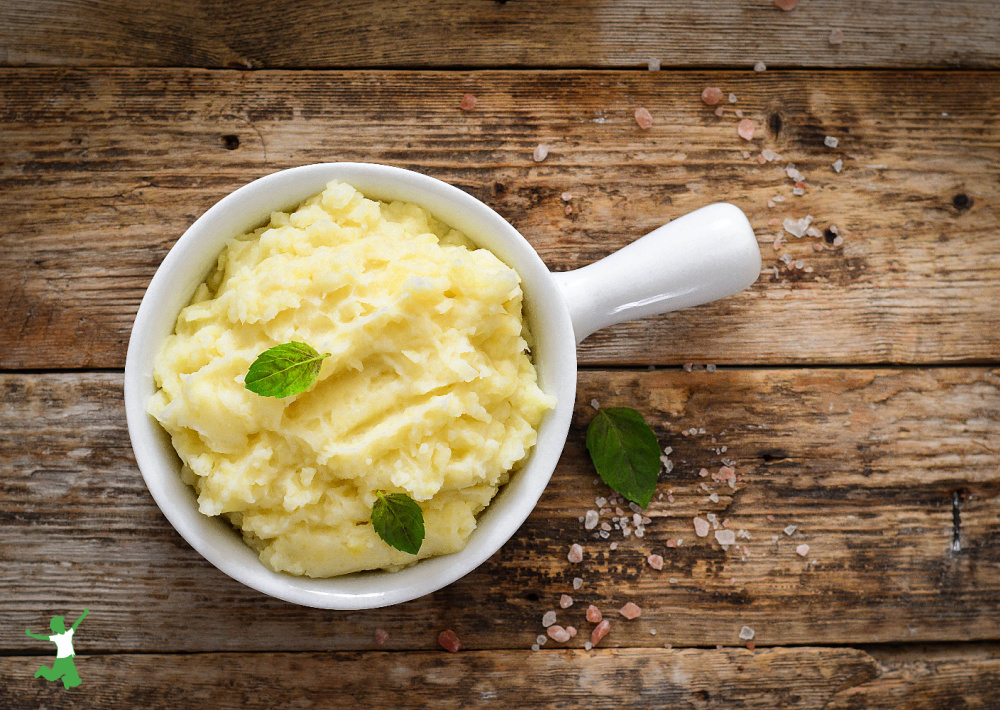 fermented potatoes in white crock