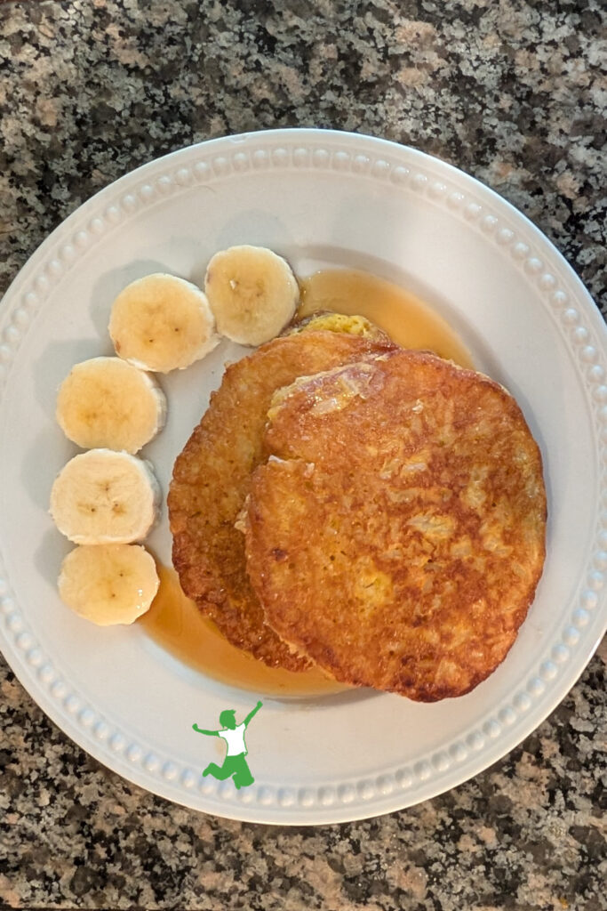 homemade rice cakes with sliced banana on white plate