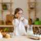 little girl drinking glass of raw grassfed milk