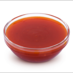 healthy sweet and sour sauce in glass bowl